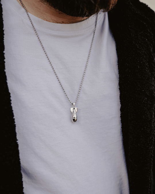 Model wearing Fallout Bomb Pendant