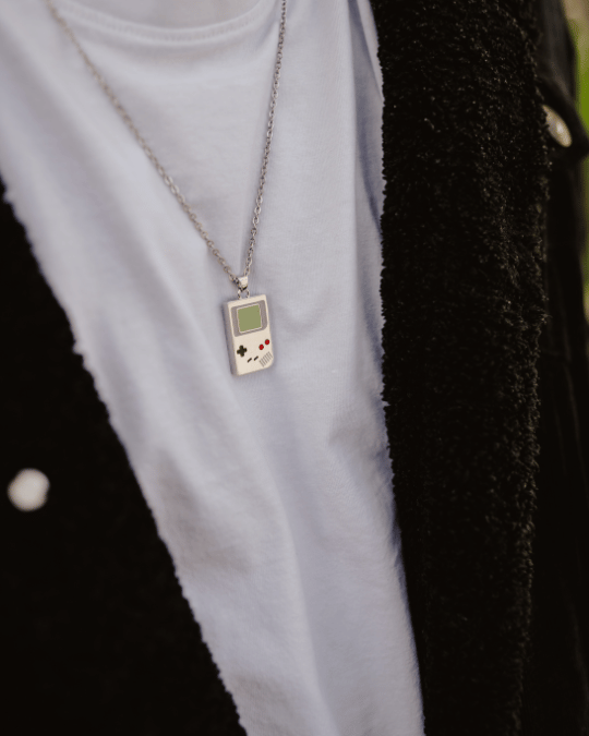 Model wearing Game Child Pendant